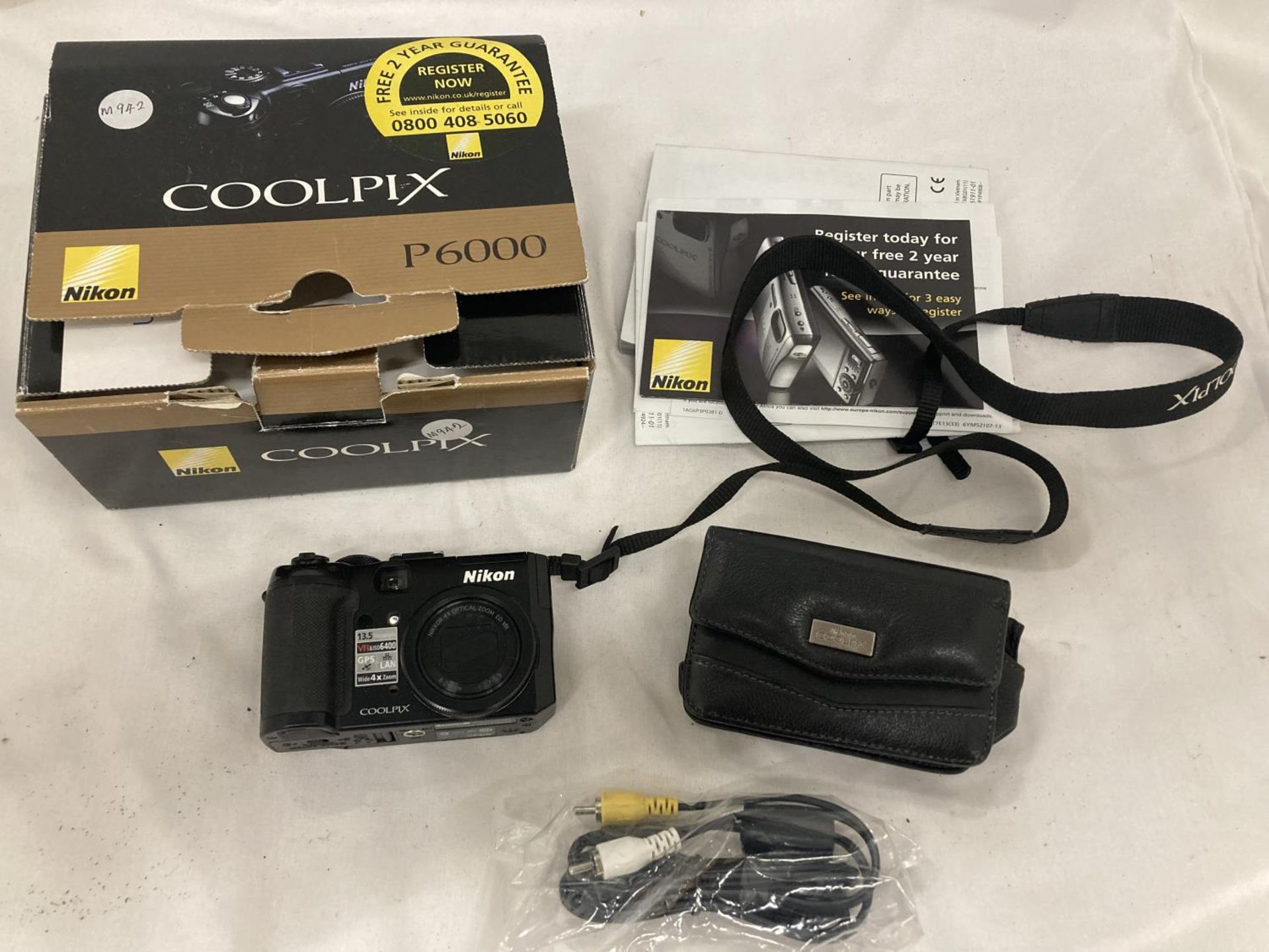 A NIKON COOLPIX P6000 CAMERA TO INCLUDE STRAP, CASE, LEADS AND INSTRUCTIONS, BOXED