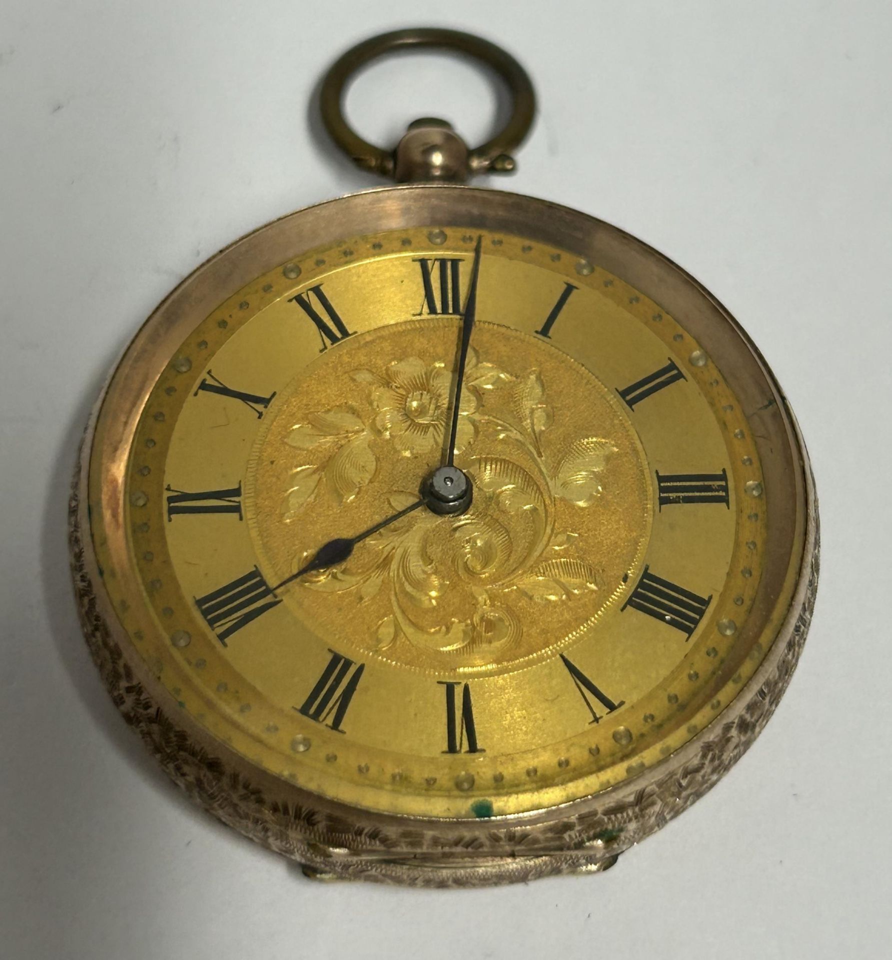 A 9CT YELLOW GOLD LADIES OPEN FACE, KEY WIND POCKET WATCH WITH ETCHED FLORAL DIAL, GROSS WEIGHT 34.