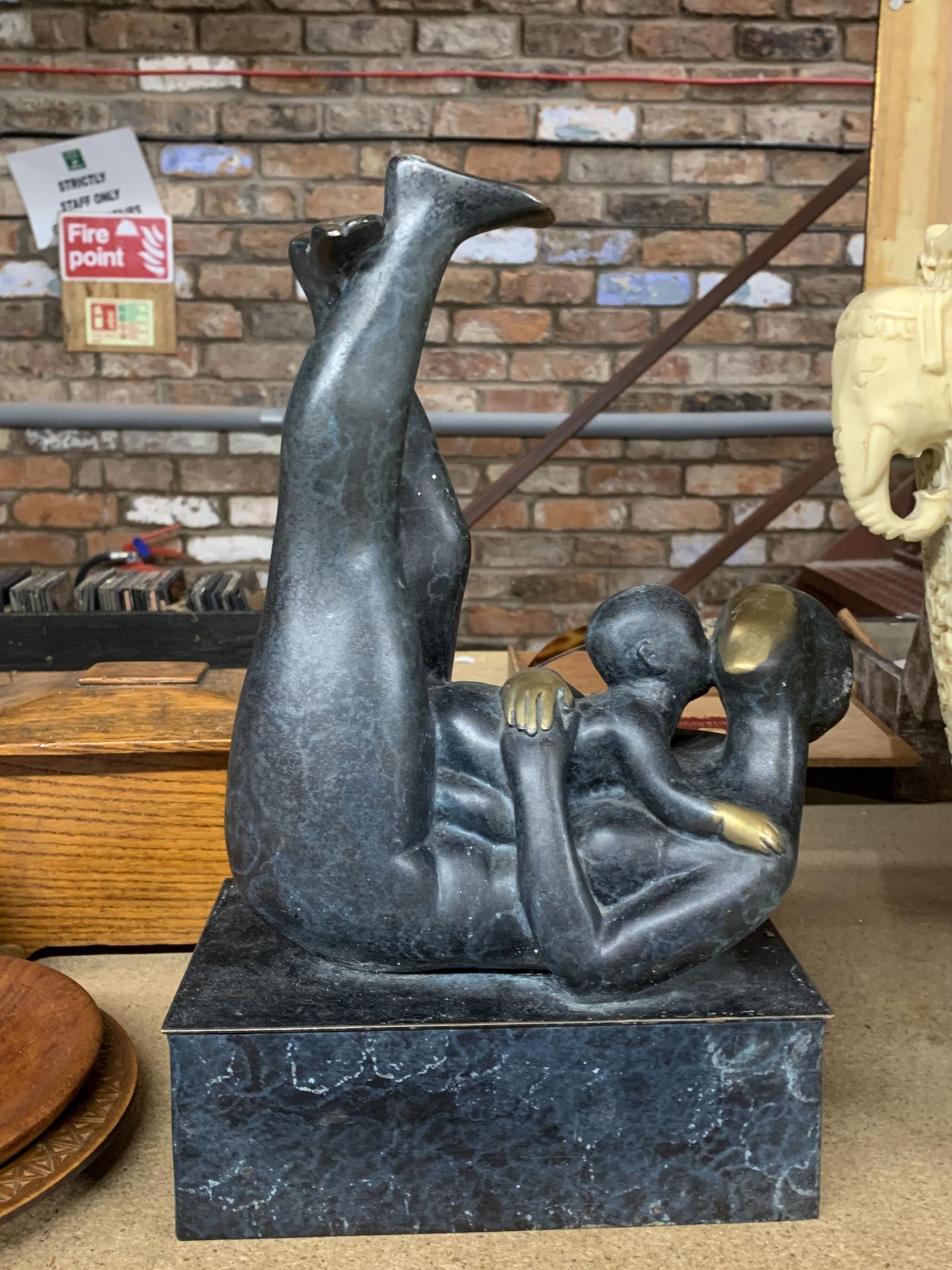 AN ABSTRACT FIGURE OF A MOTHER AND CHILD