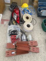 AN ASSORTMENT OF ITEMS TO INCLUDE JUMP LEADS, A CAR REAR LIGHT AND ELECTRIC CABLE ETC
