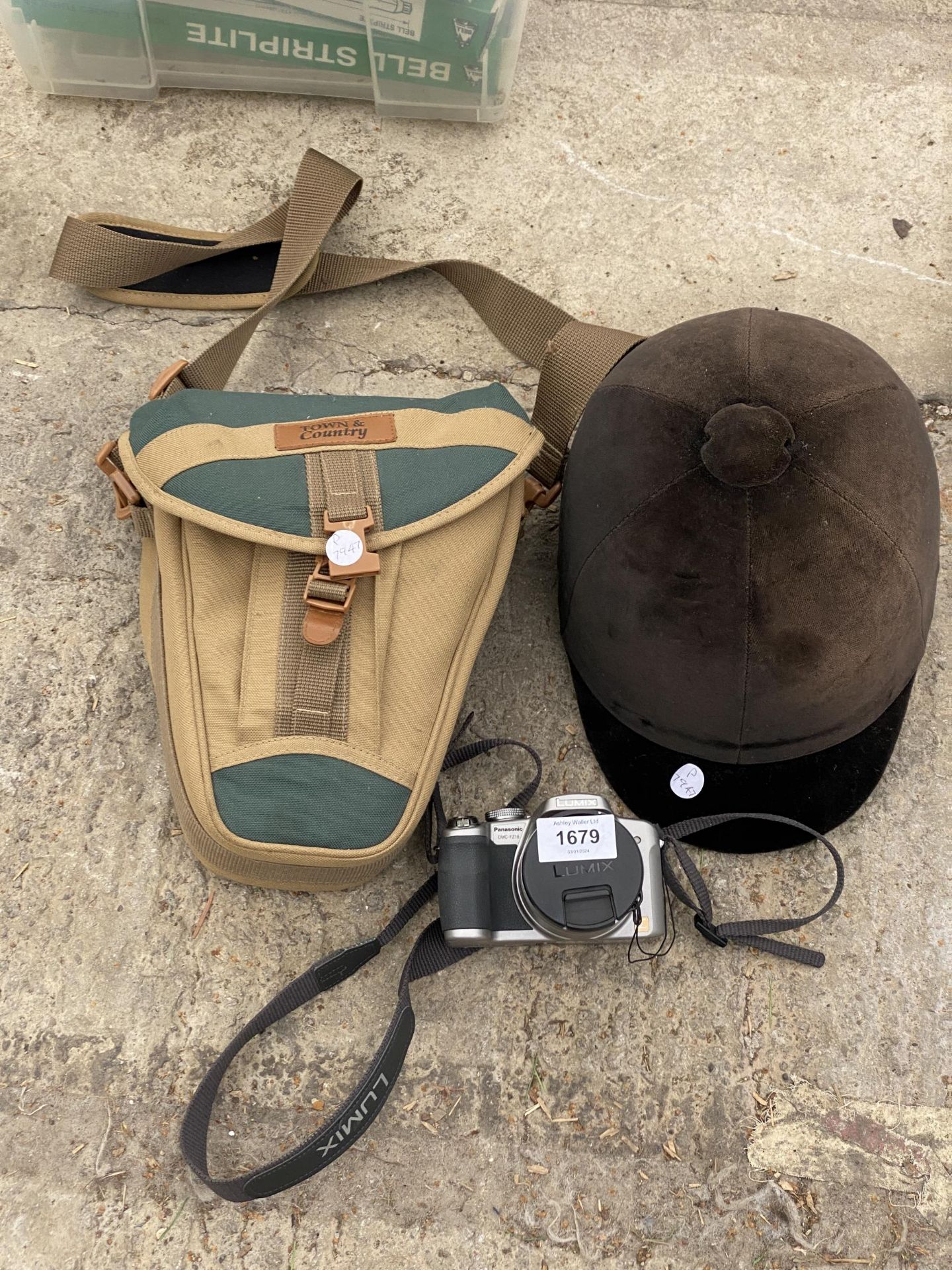 A HORSE RIDING HAT, A TOWN AND COUNTRY SATCHEL AND A LUMIX CAMERA