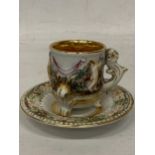 AN ITALIAN CAPODIMONTE CLASSICAL GILT DESIGN CUP AND SAUCER