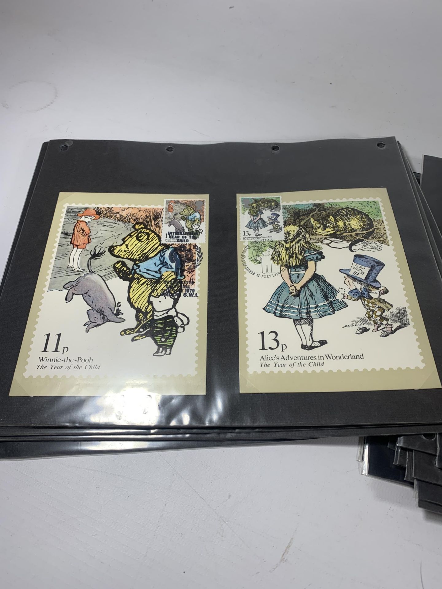 A QUANTITY OF STAMP POSTCARDS TO INCLUDE WINNIE THE POOH, ALICE'S ADVENTURE IN WONDERLAND, 25TH - Image 3 of 5