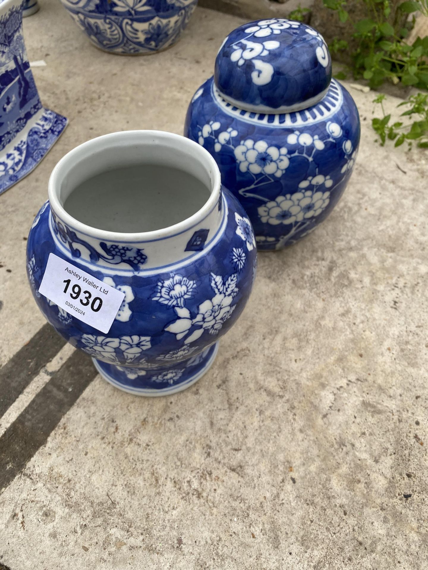 TWO BLUE AND WHITE ORIENTAL PRUNES VASES