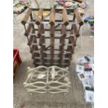 A 24 BOTTLE WOODEN AND METAL WINE RACK AND A FURTHER SIX BOTTLE WINE HOLDER