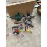 AN ASSORTMENT OF TOOLS TO INCLUDE A PASTING TABLE, AN ELECTRIC ANGLE GRINDER AND G CLAMPS ETC