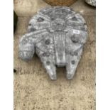 A LARGE CONCRETE STAR WARS MILLENIUM FALCON GARDEN ORNAMENT - LENGTH 52CM, WIDTH 40CM, HEIGHT 12CM.