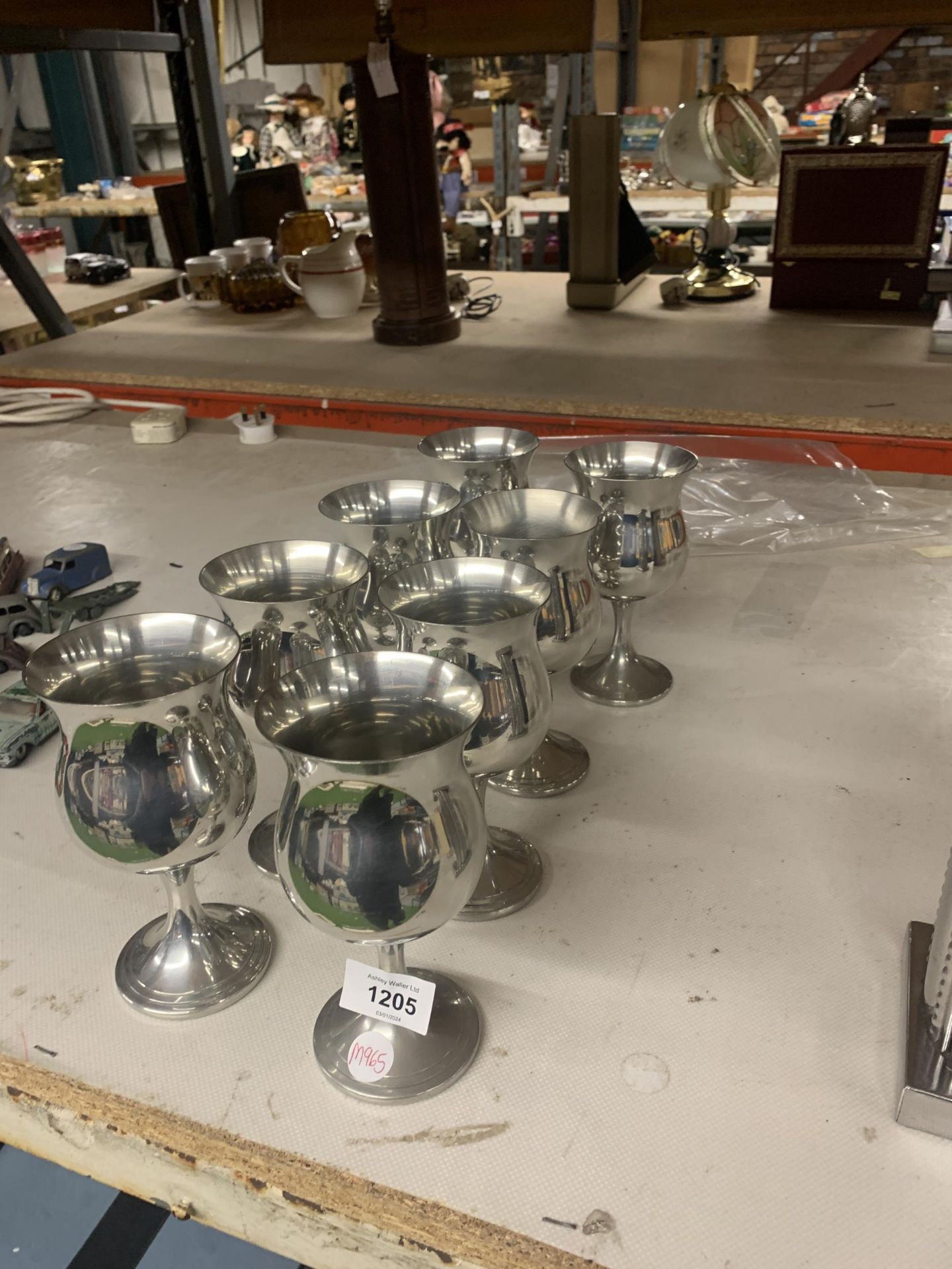 A GROUP OF EIGHT SILVER PLATED GOBLETS