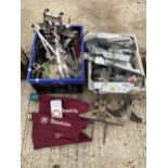 AN ASSORTMENT OF METAL WALL BRACKETS AND TOOL GUIDES ETC