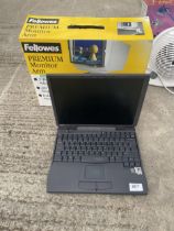 A DELL LAPTOP AND A FELLOWES MONITOR ARM