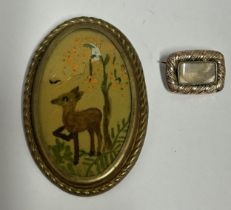 A GEORGIAN HAIR AND WIRE WORK MEMORIAL BROOCH CIRCA 1820, ON UNMARKED ROSE METAL GROSS WEIGHT 3.17