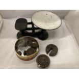 A VINTAGE SET OF WEIGHING SCALES AND WEIGHTS