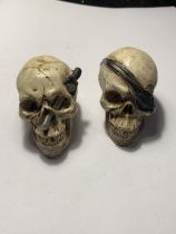 TWO PIRATE SKULLS