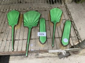 FIVE VINTAGE GREEN ENAMELED BRASS DRESSING TABLE BRUSHES