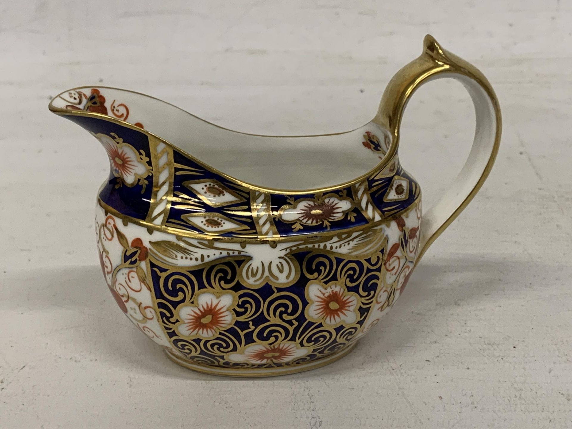 A ROYAL CROWN DERBY 2451 IMARI PATTERN CREAM JUG