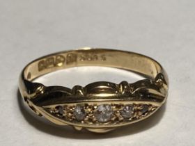 AN 18 CARAT HALLAMRKED CHESTER GOLD RING WITH FIVE IN LINE DIAMONDS SIZE N/O