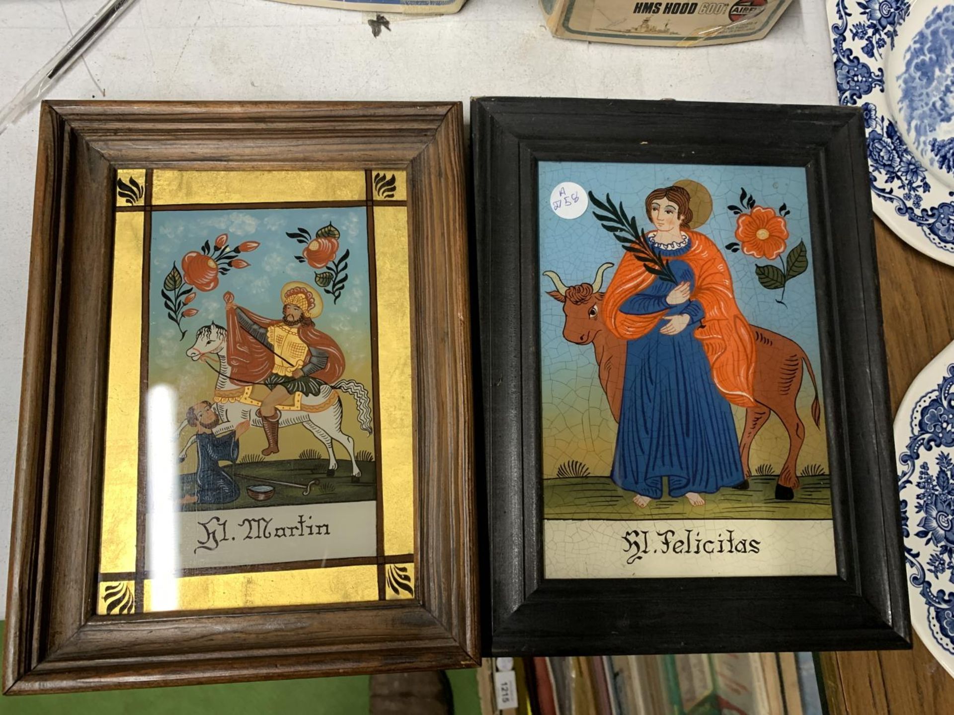 TWO REVERSE GLASS PAINTINGS OF 'FELICITAS' AND 'MARTIN'