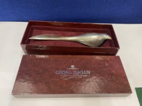 A BOXED GEORG JENSON WAGTAIL MARKED SILVER AND BLUE GLASS LETTER OPENER (GLASS A/F BUT DISPLAYS