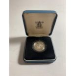A ROYAL MINT UNITED KINGDOM SILVER PROOF ONE POUND COIN