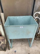 A SMALL VINTAGE METAL PLANTER WITH STAND