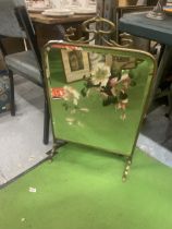 AN ART NOUVEAU DESIGN BRASS MIRRORED FIRE SCREEN