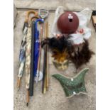 AN ASSORTMENT OF ITEMS TO INCLUDE MASKS, A BOWLING BALL AND A 'LEWIS AND WILSON' SNOOKER CUE ETC