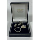 FOUR .925 SILVER ITEMS - MODERN WAVY RING AND THREE PENDANTS - SHOE, SANDAL AND HEART, IN BOX
