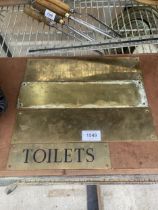 FOUR VINTAGE BRASS DOOR PLAQUES TO INCLUDE A 'TOILET' SIGN