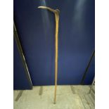 A BONE HANDLE TALL HIKING STAFF WITH BIRD EFFECT HEAD