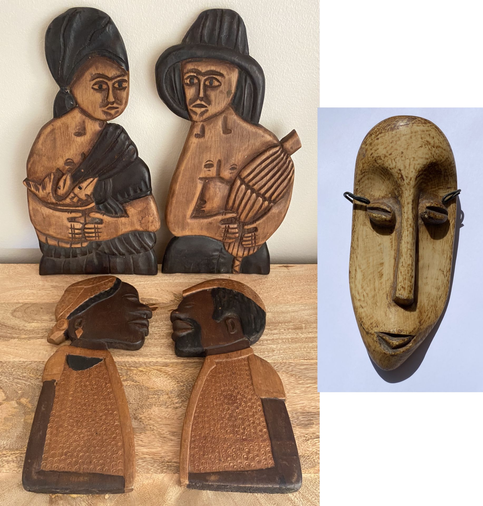 FIVE VINTAGE WOODEN AFRICAN TRIBAL MASKS TO INCLUDE TWO PAIRS OF HANGING FACE ORNAMENTS - SAO TOME