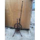 A VINTAGE MAHOGANY SPINNING WHEEL