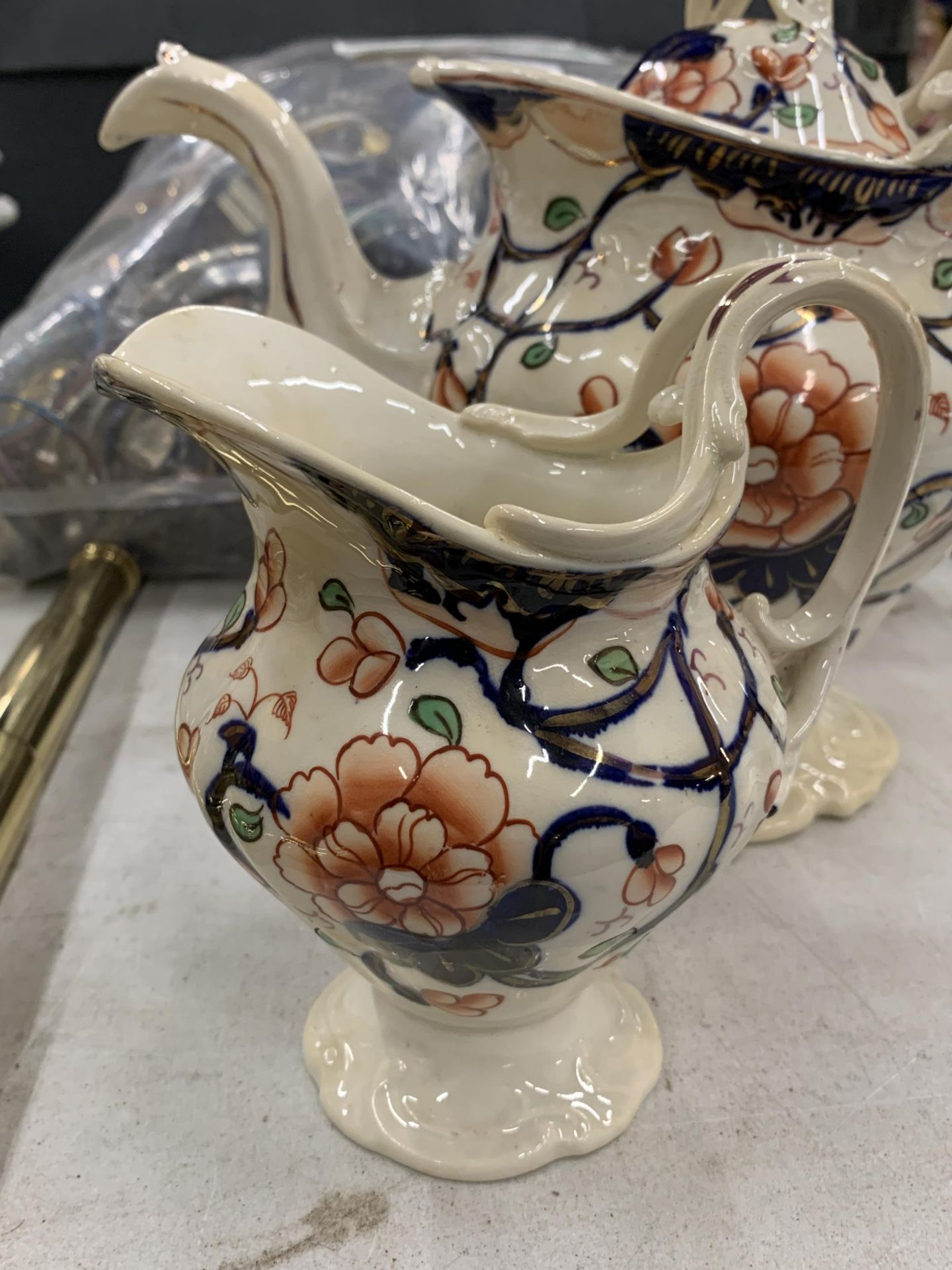 A 19TH CENTURY GAUDY WELSH DESIGN TEAPOT AND CREAM JUG - Image 2 of 4