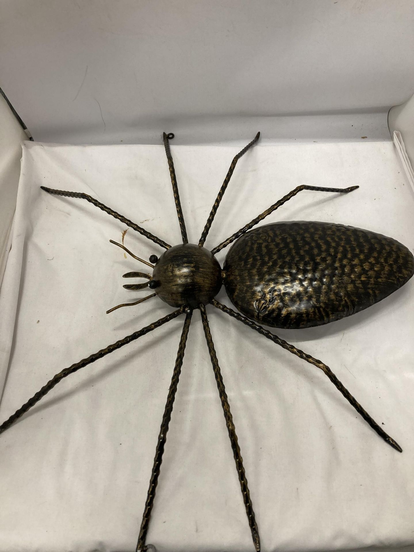 A LARGE METAL SPIDER