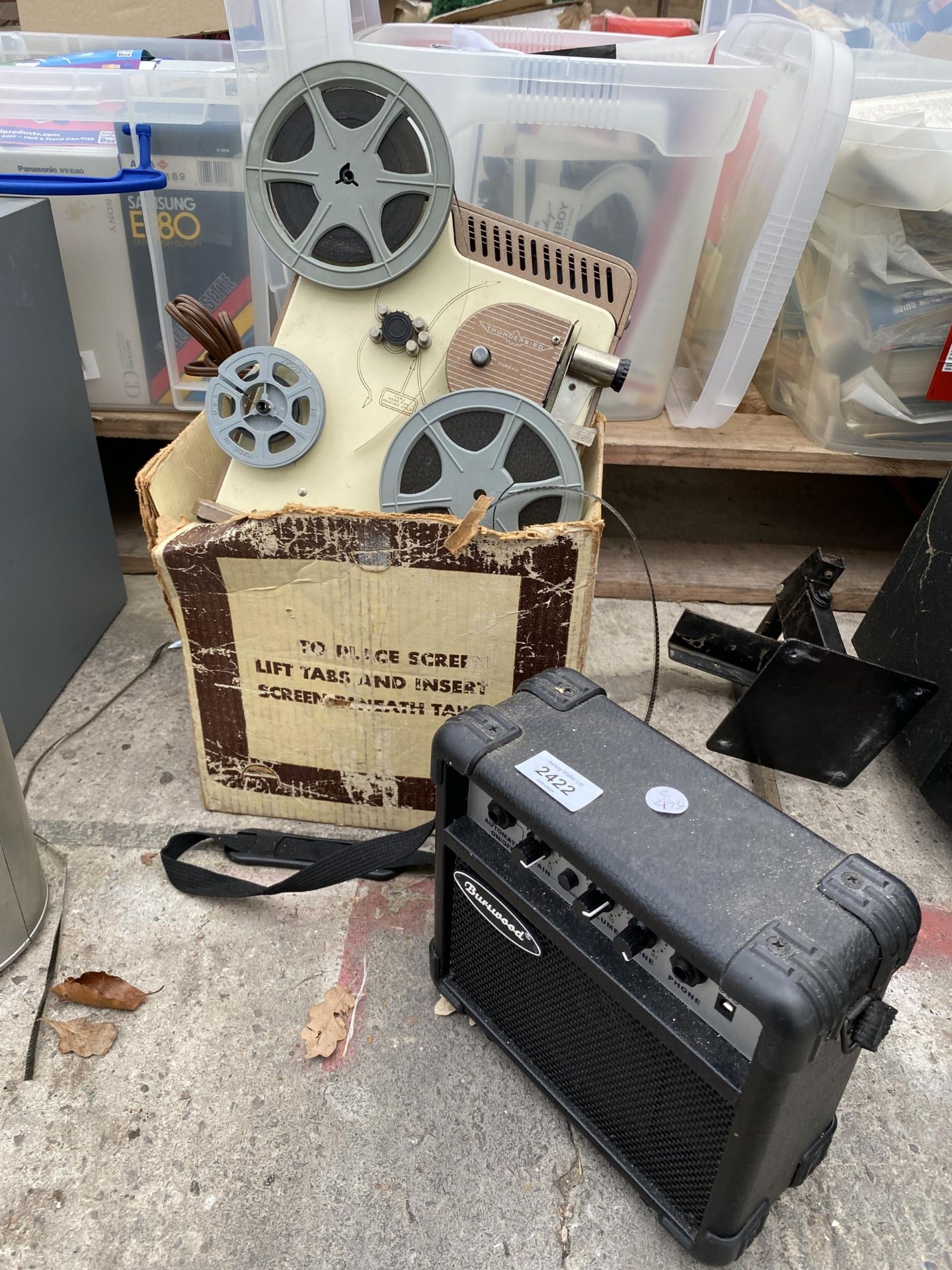 A THUNDERBIRD PROJECTOR AND A BURSWOOD AMPLIFIER