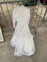 A VINTAGE LACE WEDDING DRESS