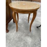 A SATINWOOD 25.5" DIAMETER OCCASIONAL TABLE