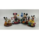 A GROUP OF FOUR DISNEY COLLECTABLE SNOWGLOBES, PLANE CRAZY, 2007 ETC