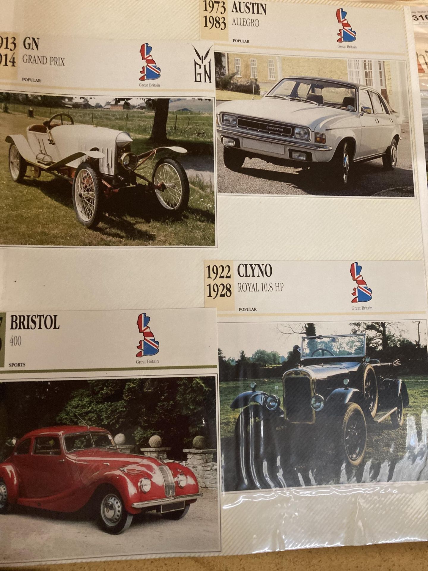 THREE ALBUMS CONTAINING APPROXIMATELY 645 VINTAGE CAR ELATED POSTCARDS IN THREE ALBUMS - Image 4 of 7