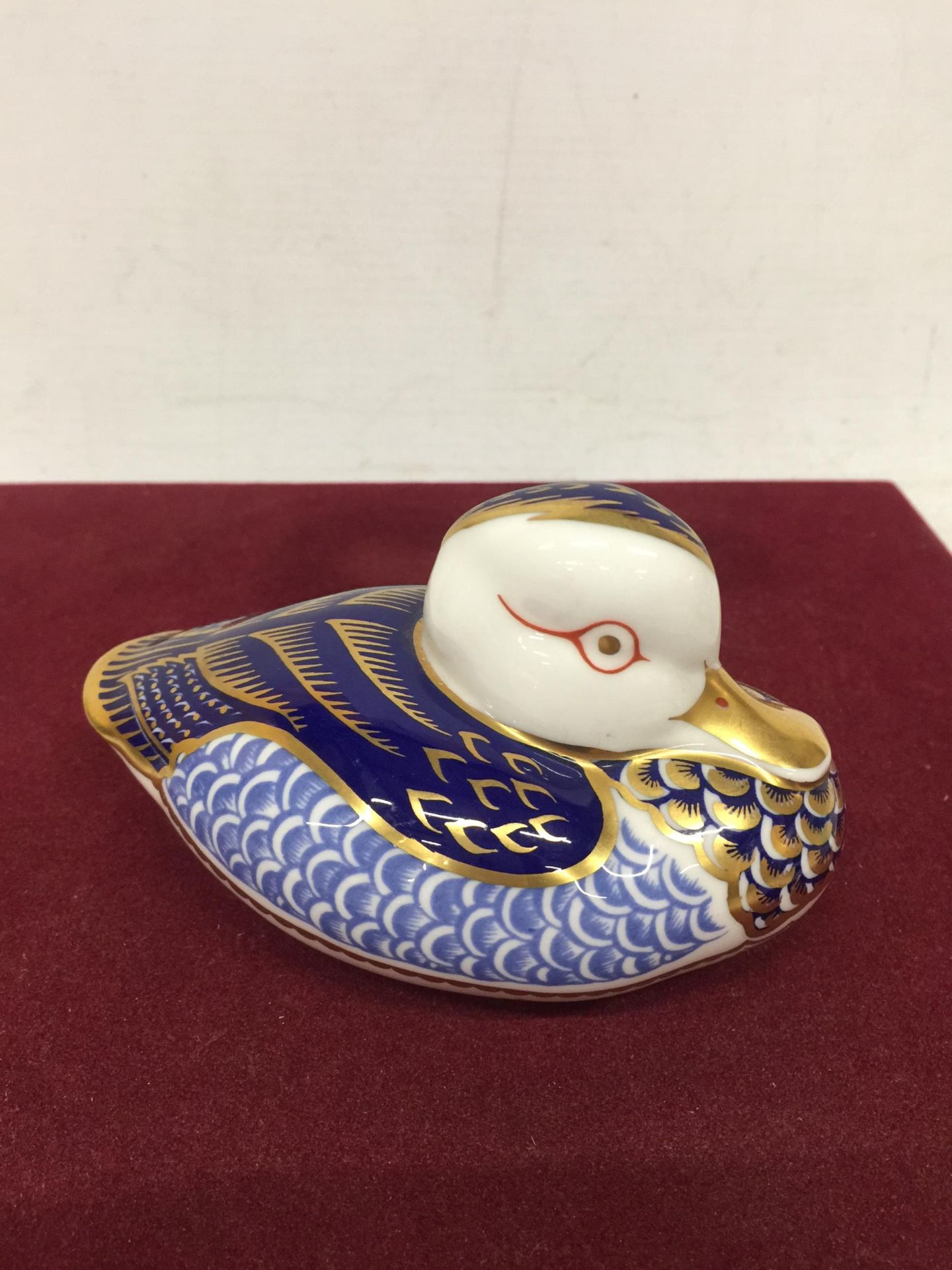 A ROYAL CROWN DERBY DUCK WITH GOLD COLOURED STOPPER - Image 2 of 3