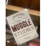 A HOGWARTS HARRY POTTER MUGGLE STUDIES METAL SIGN