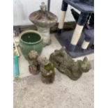 AN ASSORTMENT OF RECONSTITUTED STONE GARDEN FIGURES AND A BIRD BATH