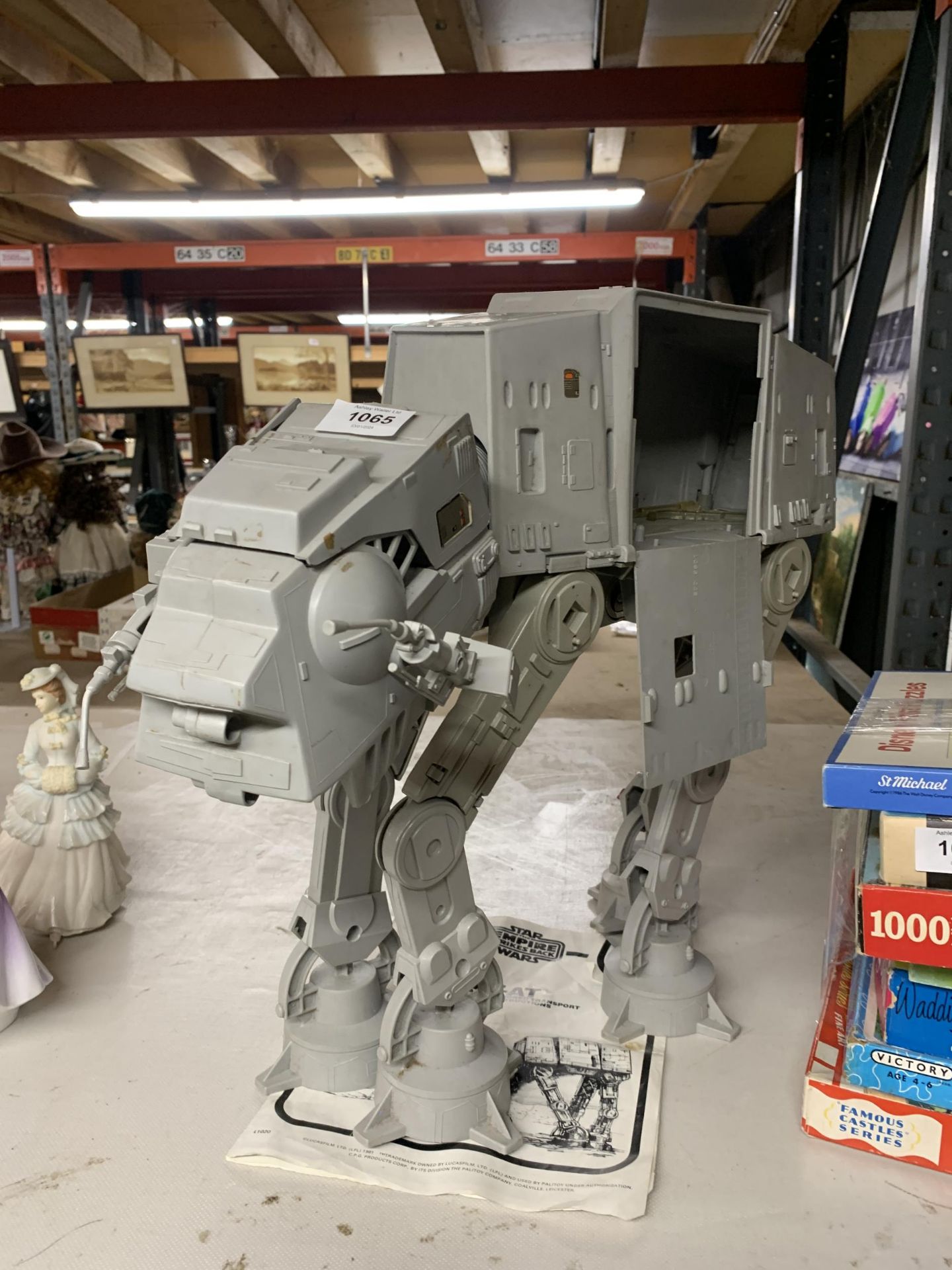 A VINTAGE STAR WARS AT-AT TOY WITH ORIGINAL INSTRUCTIONS