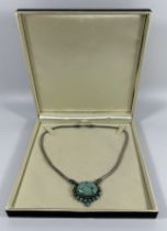 A BOXED .925 SILVER TURQUOISE STONE DESIGN PENDANT NECKLACE, 18" CHAIN LENGTH