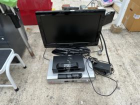 A SHARP 26" TELEVISION WITH REMOTE CONTROL, A SONY VHS PLAYER AND A FREEVIEW BOX ETC
