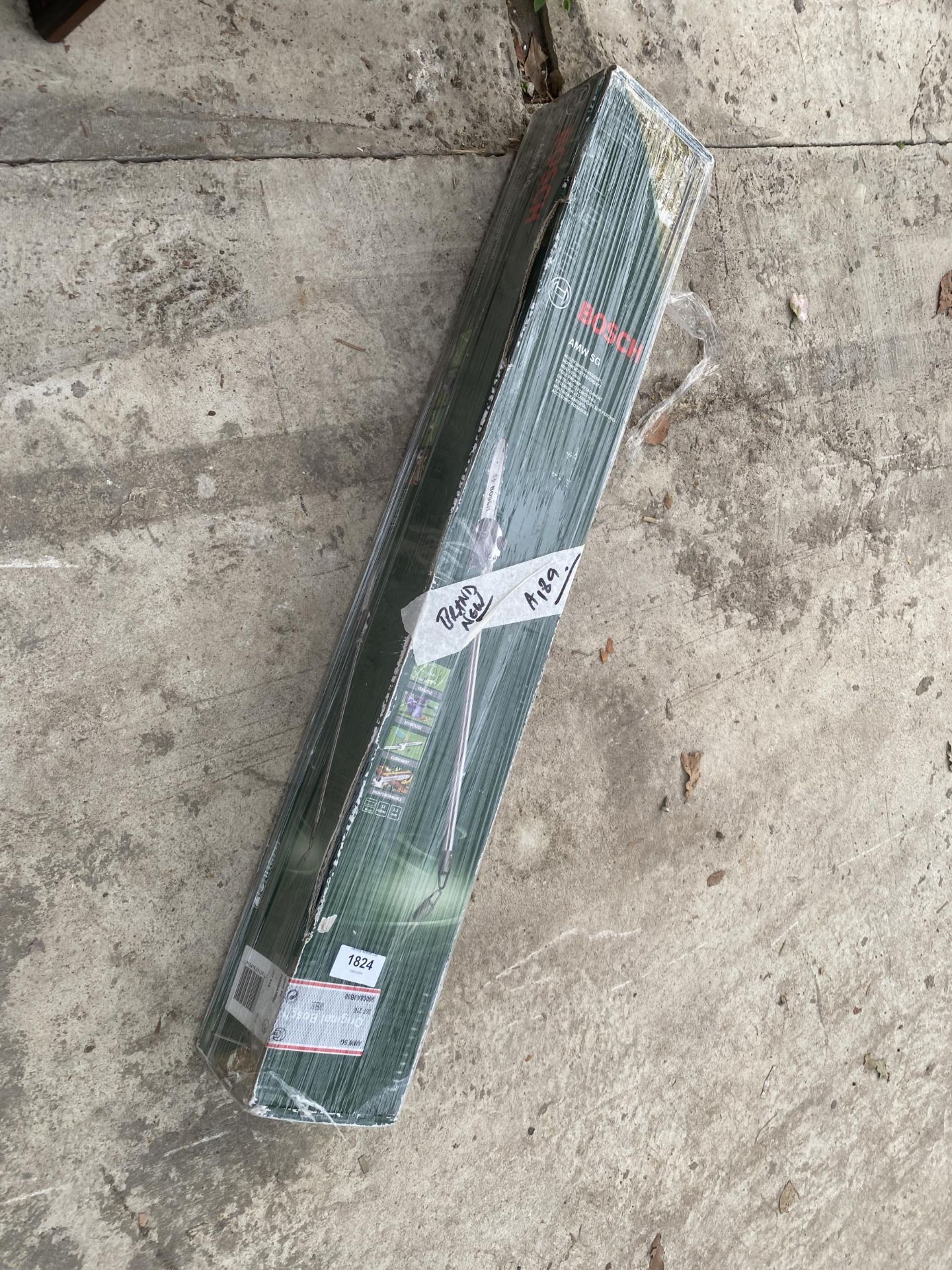 A BOXED BOSCH LONG REACH CHAINSAW ATTATCHMENT