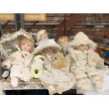 A MIXED LOT OF DOLLS AND SOFT TOYS