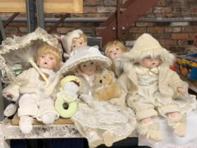 A MIXED LOT OF DOLLS AND SOFT TOYS