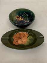 TWO MOORCROFT POTTERY ITEMS TO INCLUDE HIBISCUS ASHTRAY AND ORCHID BOWL