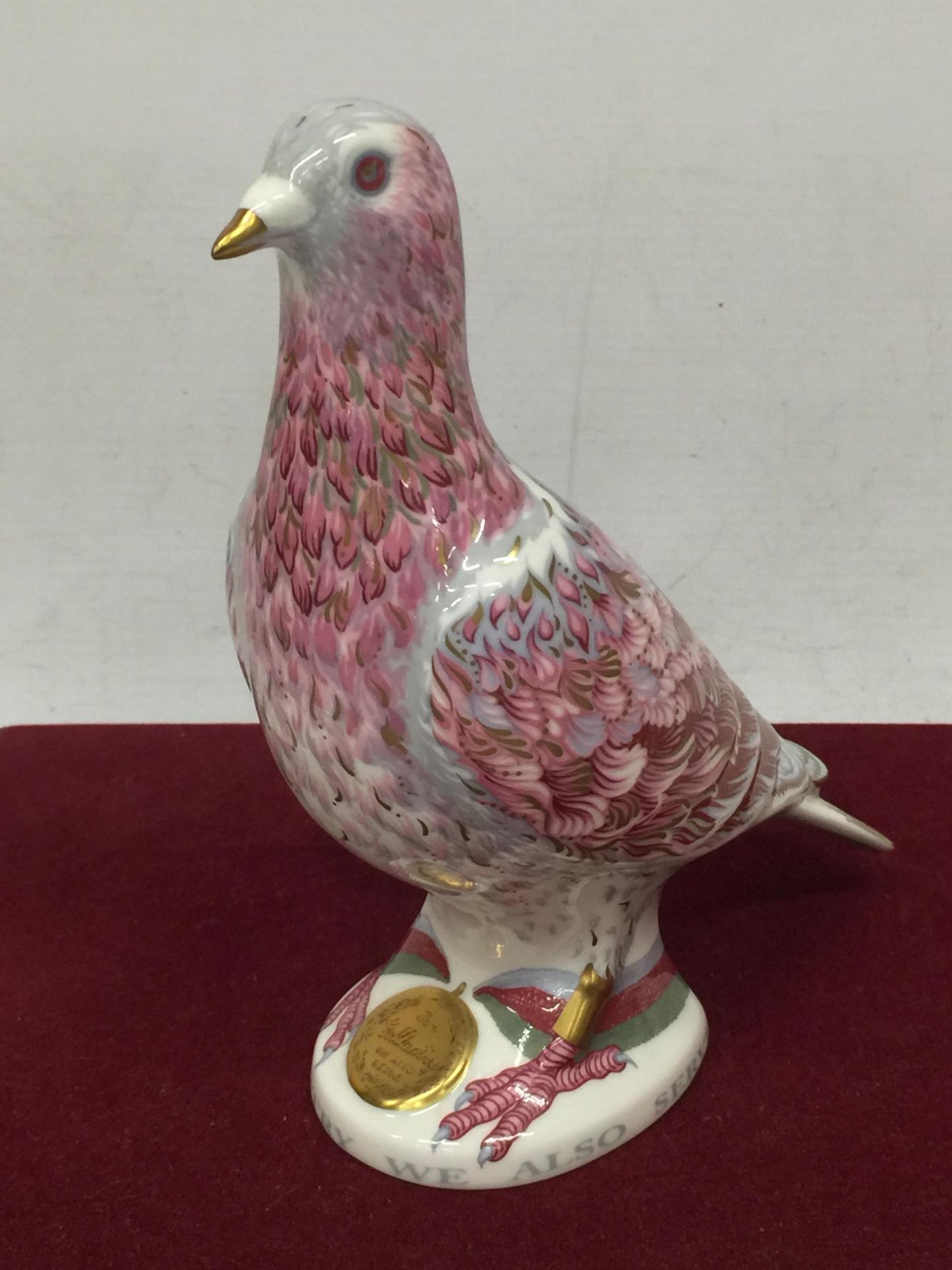 A ROYAL CROWN DERBY BOXED WAR PIGEON LIMITED EDITION PAPER WEIGHT