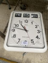 A RETRO GRAYSON TIME MANAGEMENT SYSTEM CLOCK AND AUTOMATIC CALANDER